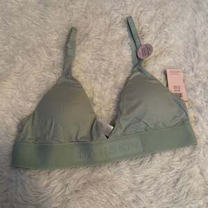 Danskin Women's Seamless Ribbed Triangle Bralette with Removable Cups Sage Green